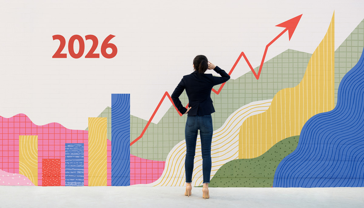 Image shows a woman standing in front of a brick wall with her hand scratching her head. The wall has charts and graphs on it to signify money management.